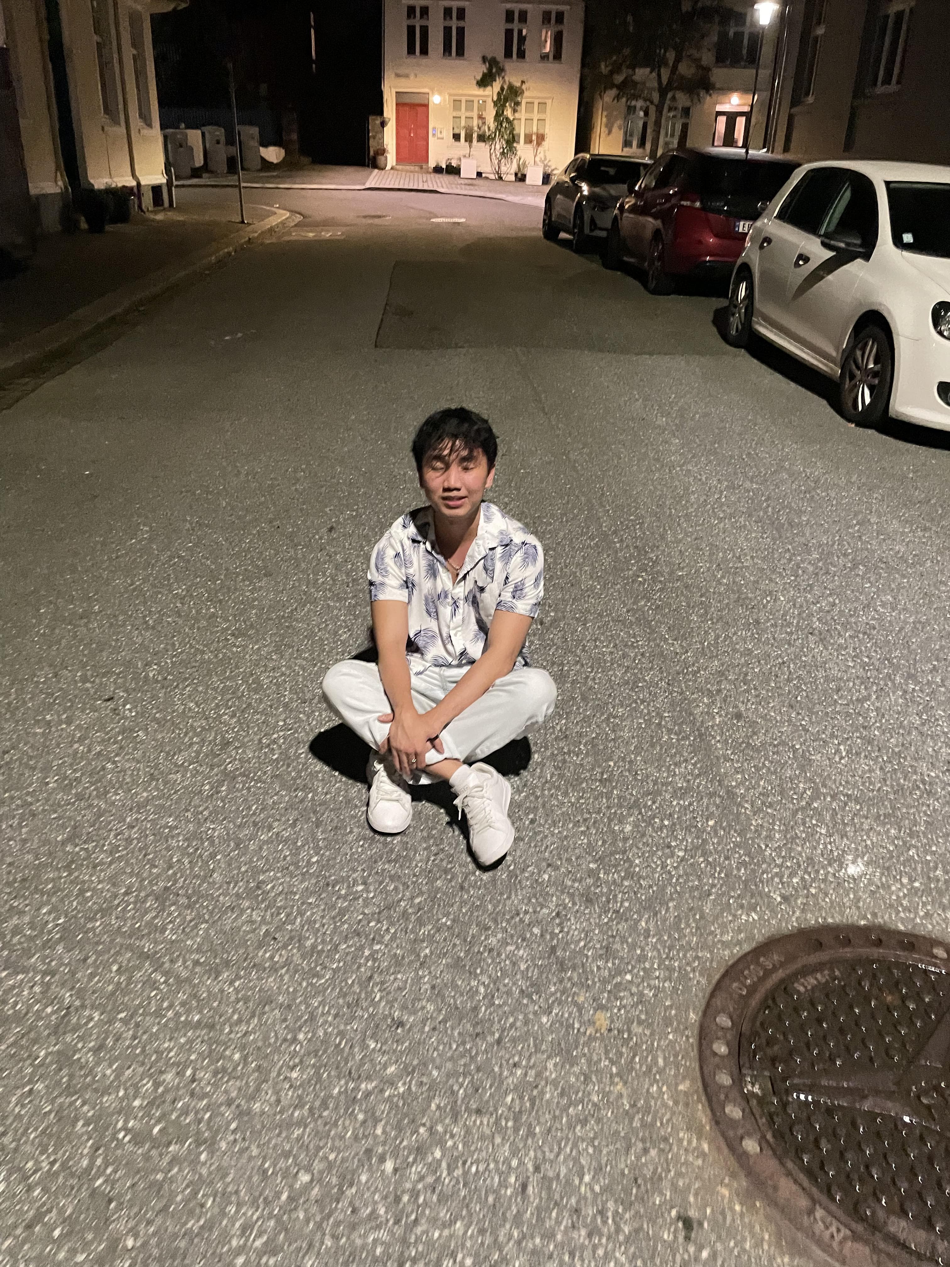 sit on the road and smile
