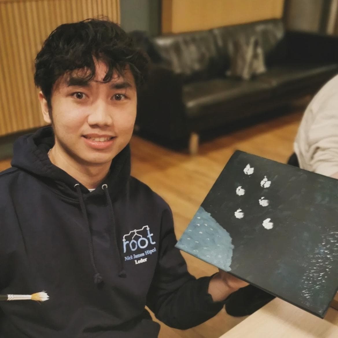 me holding my arguably first painting